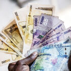 The the notes of an expensive cash economy of Uganda.<br />The Functions of a Central Bank and its administrative Governor can be discussed as follows:<br />Currency regulator <br />Bank for the government.<br />Custodian of Cash reserves.<br />Custodian of International currency.<br />Lender of last resort(very important indeed)<br />Clearing house for transfer and settlement.<br />Controller of credit(very important indeed)<br />Protecting depositors interests.<br />What would one expect to do if the country of Uganda seems not to need such a governor? Most probably a political one is the one presently working for this country!