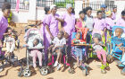 Disabled children and caretakers at Home of Hope facility.<br />One hopes that such disabled children all over the other developed countries have greater opportunities to involve themselves in normal community experiences. Where parents and foster parents are facilitated to try and live with such children with that hope coming much more from them than from these children.
