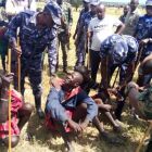 Some of the suspected cattle rustlers in the North Eastern Province of Karamojong being handcuffed following their arrest in Moroto District recently by the Uganda Army: