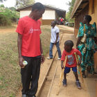 A disabled kid in Uganda struggles to walk with wooden handle bars.<br />People with disabilities (PWDs) have urged the government to implement the 2013 Building Control Act to enable them access public facilities.<br />This will continue to be a dream for the citizens of Uganda as the NRM government consolidates a return to the Movement system of governance!